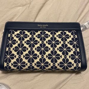Brand New Italian Spade flower jacquard with leather. Color dark blue
